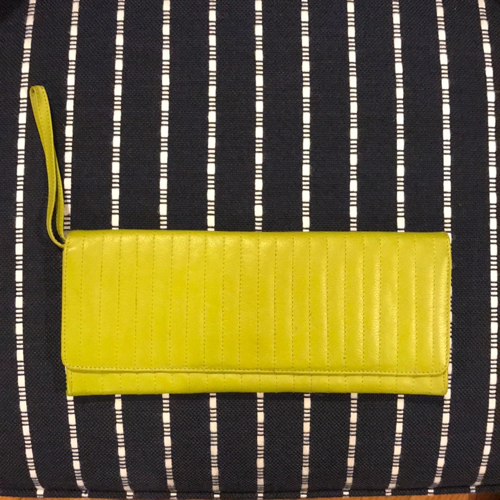 Barney’s New York lime green clutch wristlet
